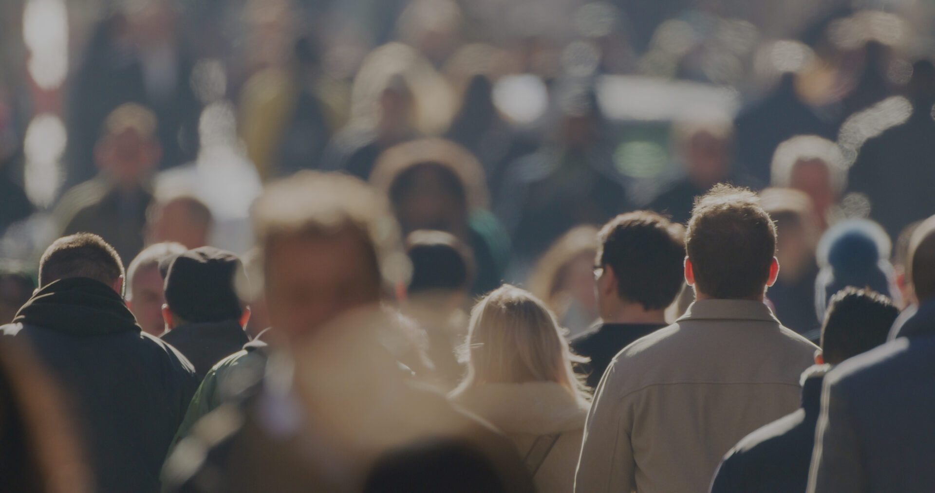 crowd walking away from viewer's point of view